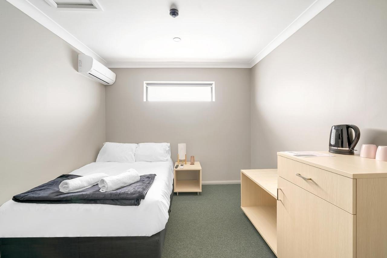 Queen Room with Shared Bathroom