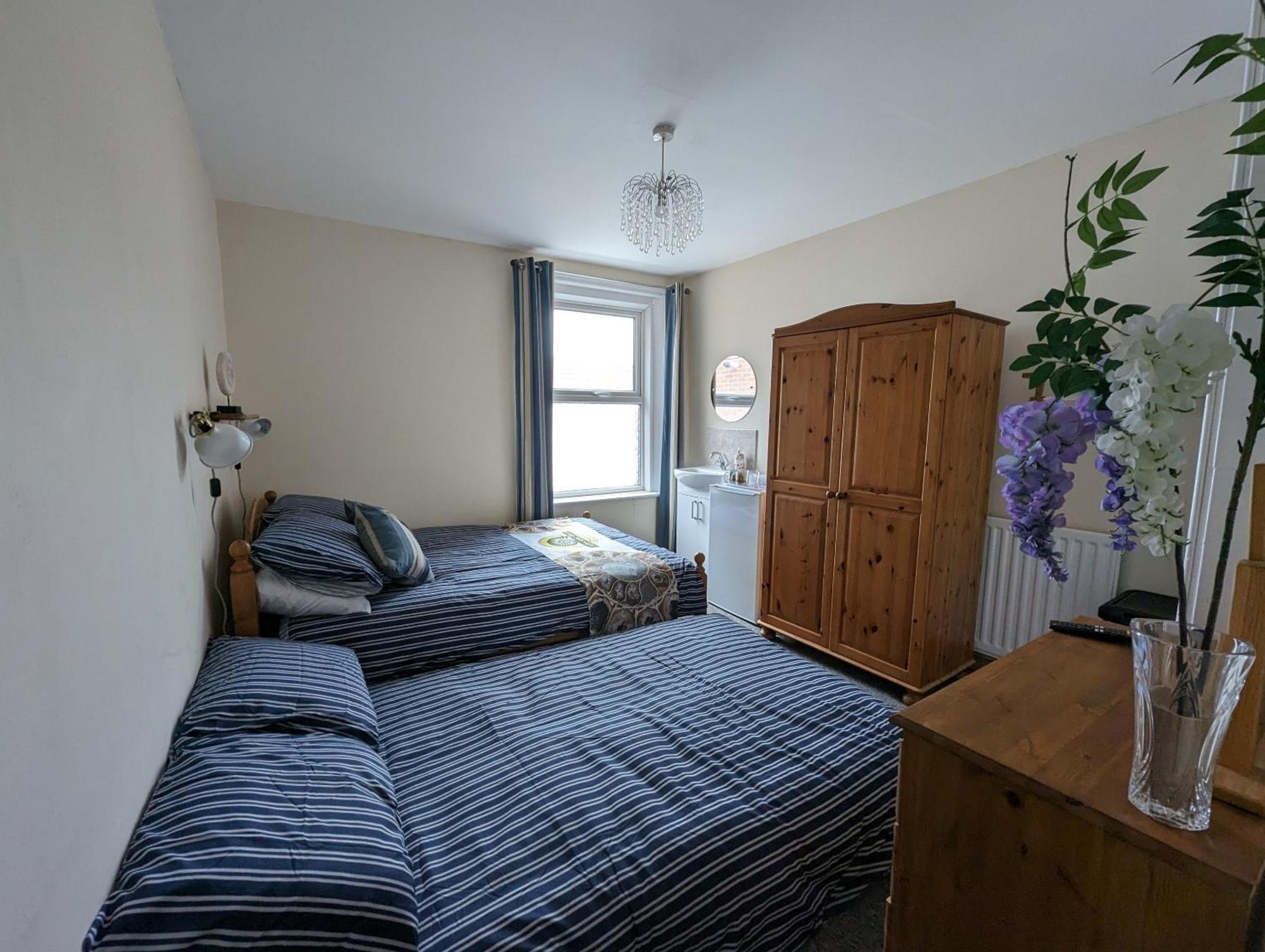 Economy Quadruple Room with Shared Bathroom