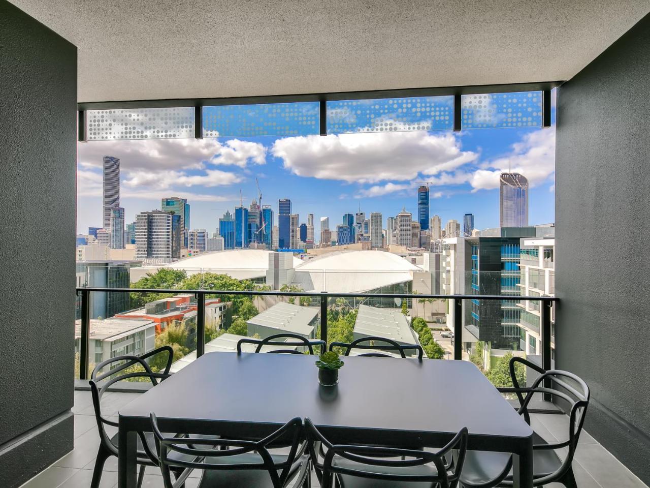 Two-Bedroom Executive Apartment with Balcony and City Views