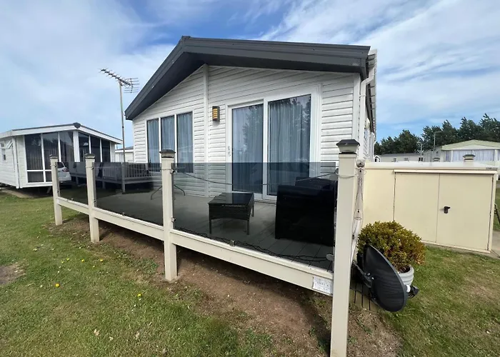 Stunning Lodge Boasting Large Decking Area At California Cliffs Ref 50008L Great Yarmouth